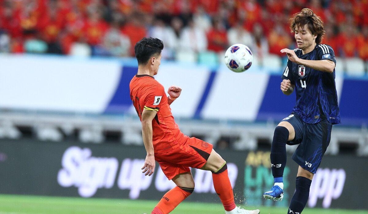 Japan remain top of Group C after defeating China in World Cup Qualifiers.